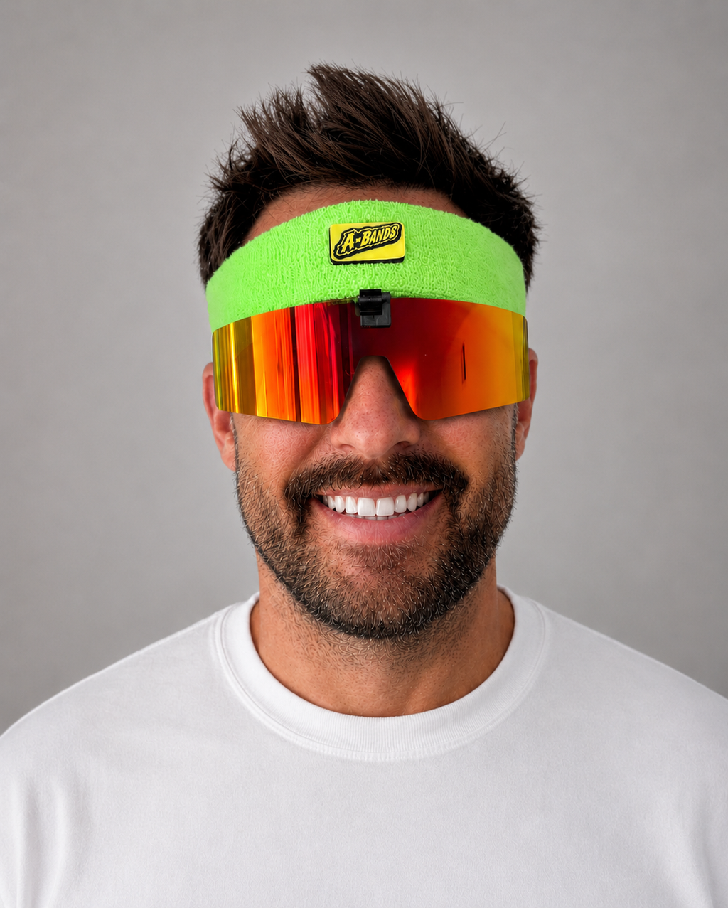 Green headband with red lenses, front view