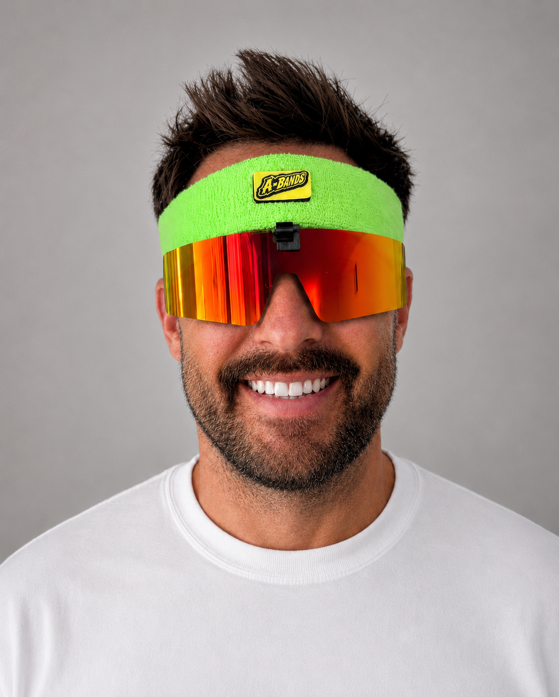 Green headband with red lenses, front view